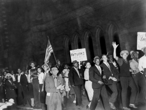Demonstration After Joe Louis'S One-Round Victory Over German Heavy Weight Champion Max Schmeling. Smiling Harlemites Carrying A Sign Demanding The Ouster Of 'Hitler'S Agents And Spies History - Item # VAREVCHISL033EC658
