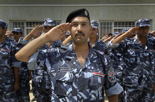 Graduates Of The Iraqi Police Academy'S Salute During The Commencement Ceremony In Salman Pak Iraq. Aug. 29 2008. History - Item # VAREVCHISL027EC188