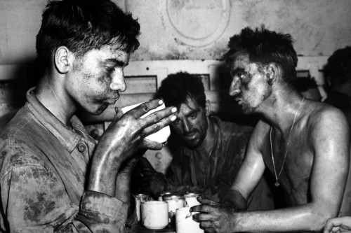 U.S. Marines After Two Days And Nights Of Fighting On Eniwetok Island Against Japanese. Marine Holding The Coffee Cup Is 19 Year Old Pfc. Faris Tuoly. Feb. 1944. History - Item # VAREVCHISL036EC561