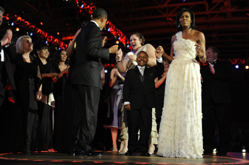 President And Michelle Obama Dance With Guests At The Neighborhood Ball. Michelle Is Wearing An Ivory Chiffon One Shoulder Dress By Jason Wu. Jan. 20 2009. Jan. 20 2009. History - Item # VAREVCHISL026EC179 President And Michelle Obama Dance With Guests At The Neighborhood Ball. Michelle Is Wearing An Ivory Chiffon One Shoulder Dress By Jason Wu. Jan. 20 2009. Jan. 20 2009. History - Item # VAREVCHISL026EC179