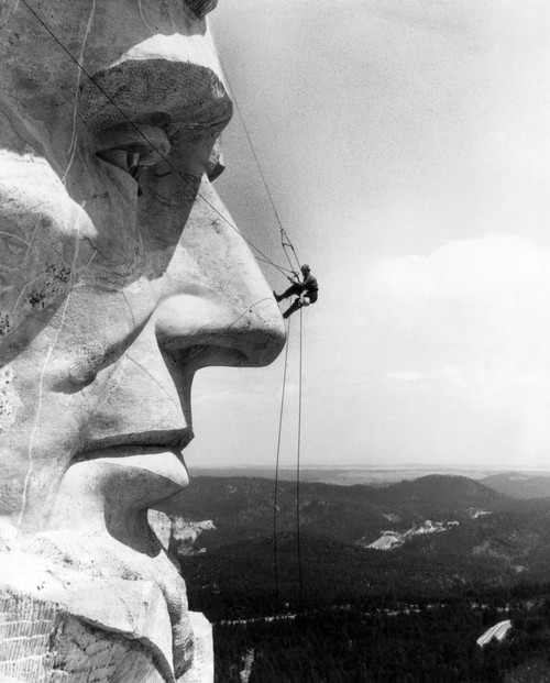 A Maintenance Worker On The Nose Of Mount Rushmore'S Abraham Lincoln History - Item # VAREVCHBDMORUCS003