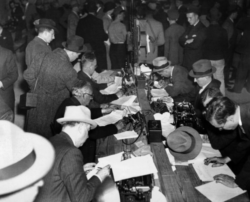 First Reports Of The Hindenburg Disaster. Newspaper Men And Telegraph Operators Work Together In The Pressroom Of Lakehurst Naval Air Station To Report The Hindenburg Disaster. May 6 History - Item # VAREVCCSUA001CS416