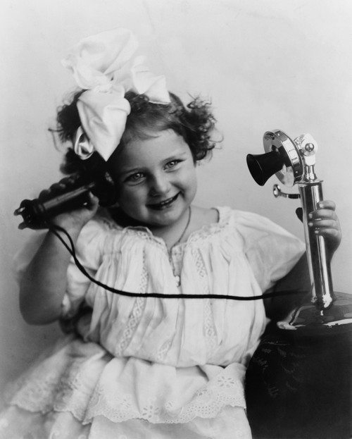 Little Girl Talking On An Early Model Telephone. Ca. 1905. History - Item # VAREVCHISL020EC139