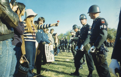Female Demonstrator Offers A Flower To Military Police During The 1967 March On The Pentagon. 50 History - Item # VAREVCHISL040EC439