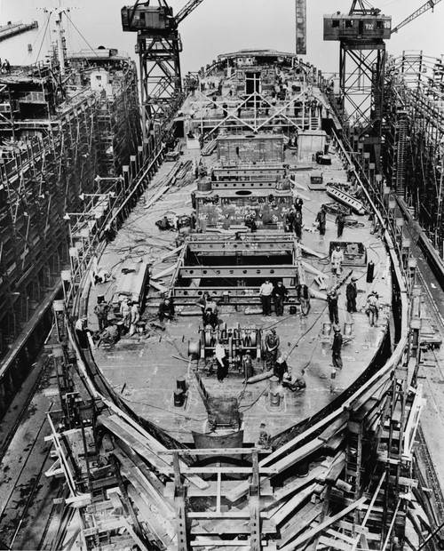 On The Fourteenth Day Of The Construction Of A Liberty Ship. The Upper Deck Mast Houses And After-Deck House Are In Place. Bethlehem Fairfield Shipyards Near Baltimore Maryland. Ca. 1942-43. History - Item # VAREVCHISL033EC022