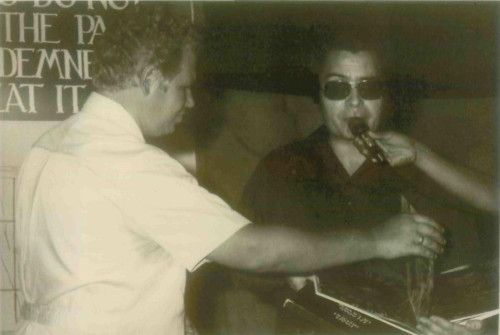 Jim Jones With One Of The Fact Finding Visitors That Accompanied Congressman Leo Ryan To Jonestown. People'S Temple Agricultural Project. Jonestown History - Item # VAREVCHISL034EC397 Jim Jones With One Of The Fact Finding Visitors That Accompanied Congressman Leo Ryan To Jonestown. People'S Temple Agricultural Project. Jonestown History - Item # VAREVCHISL034EC397