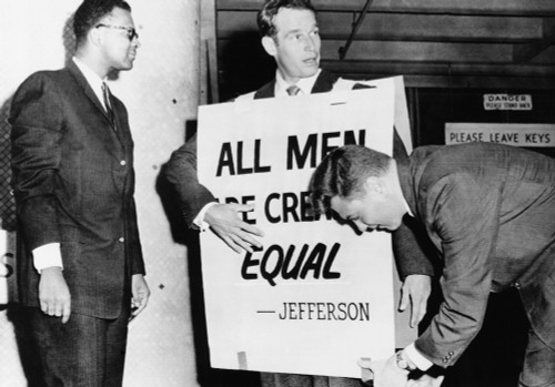 Actor Charlton Heston Adjusts A Sandwich Board For A Civil Rights Demonstration. Oklahoma City History - Item # VAREVCCSUB002CS122