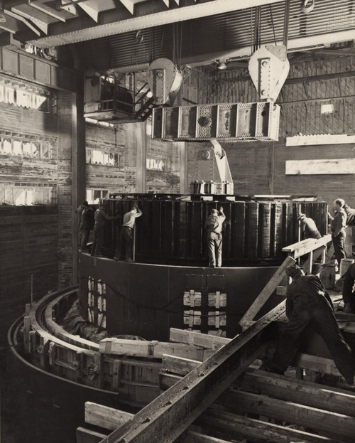 Workmen Installing A Generator In The Norris Dam Powerhouse. Norris Dam Was The First Major Project Of The Tennessee Valley Authority History - Item # VAREVCHISL009EC102 Workmen Installing A Generator In The Norris Dam Powerhouse. Norris Dam Was The First Major Project Of The Tennessee Valley Authority History - Item # VAREVCHISL009EC102