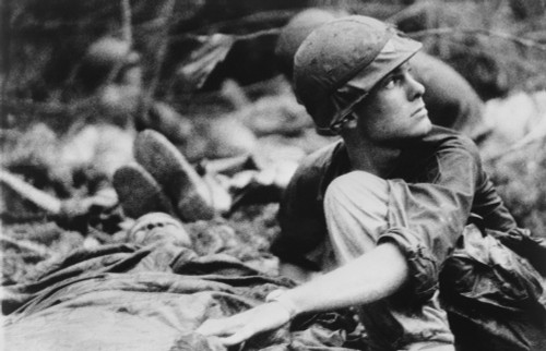 Vietnam War. Army Medic Searches The Sky For A Medevac Helicopter To Evacuate Wound Soldiers History - Item # VAREVCHISL033EC546