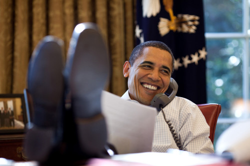 President Barack Obama Smiles While Talking With Russian President Dmitry Medvedev On The Phone In The Oval Office Saturday Dec. 12 2009. History - Item # VAREVCHISL025EC165