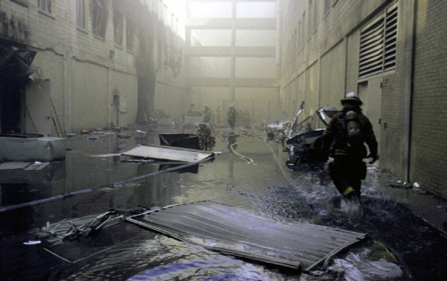 Inside The Damaged Pentagon Firemen Walk Towards The Fire On The Day After The Al-Qaeda Terrorists Crashed A Jetliner Into The U.S. Military Headquarters. History - Item # VAREVCHISL025EC034