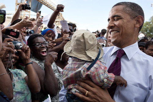 President Barack Obama Holds A Baby After Delivering Speaking In Cincinnati History - Item # VAREVCHISL039EC829