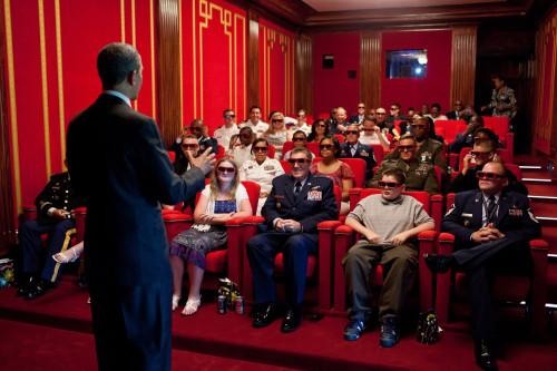 President Obama Welcomes Service Members And Their Families To The White House Family Theater. They Are Prepared To Watch The 3-D Movie History - Item # VAREVCHISL040EC312