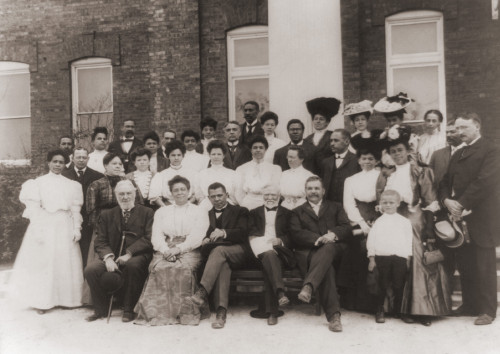 Tuskegee Institute Faculty With Their Patron Andrew Carnegie At Tuskegee Alabama 1906. Seated In Front Row L To R R.C. Ogden Mrs. Booker T. Washington Booker T. Washington Andrew Carnegie And An Unidentified Person. - Item # VAREVCHISL024EC080