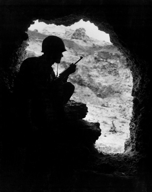 Marine Rifleman Positioned In An Cave To Pick Off Japanese Snipers In The Surrounding Ridges. Battle Of Okinawa History - Item # VAREVCHISL036EC776