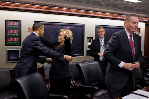 Hillary Clinton Joyfully Congratulates President Obama After House Of Representatives Voted To Pass Health Care Reform. The Vote Came In Just Prior To A Meeting In The Situation Room Of The White House. March 22 2010. - Item # VAREVCHISL026EC165