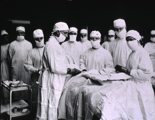Surgeons And Nurses Masked In Preparation For Surgery At U.S. Army General Hospital In Detroit History - Item # VAREVCHISL015EC193