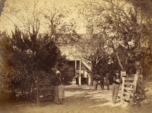 A Newly Liberated Female Slave And Union Soldiers Stand In At The Entrance To The Captured Plantation Of The General Thomas F. Drayton History - Item # VAREVCHISL009EC219
