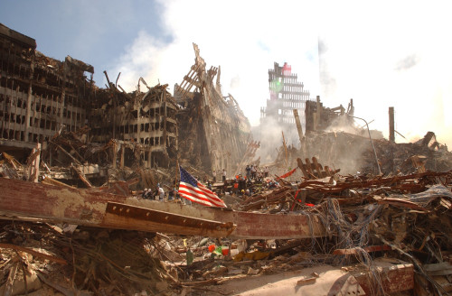 Smoke Rises From The World Trade Center'S Collapsed North Tower. On The Left Are The Remains Of A Lower Structure History - Item # VAREVCHISL040EC093