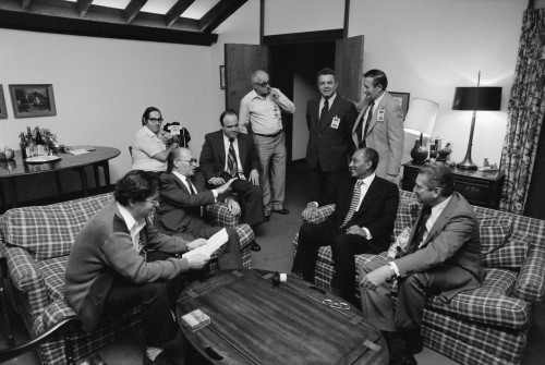 Menahem Begin And Anwar Sadat With Members Of The Israeli And Egyptian Delegation At Camp David. Such Cordiality Between Begain And Sadat Was Rare During In The 12 Day Marathon Summit Negotiations. Sept 5-17 1978. History - Item # VAREVCHISL029EC182