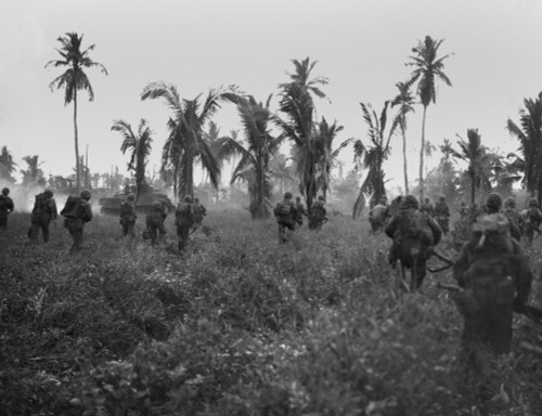 U.S. Marines In Pursuit Of Retreating Japanese On Guam Island. Sherman Tanks Lead The Assault Through Thick Brush. July 1944 History - Item # VAREVCHISL037EC018