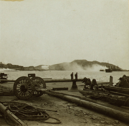 Smoke Rises From Russian War Ships And Port Arthur Town During Shelling By Japanese In Dec. 1904. After Japanese Forces Captured 306 Metre Hill Overlooking The Harbor History - Item # VAREVCHISL046EC284