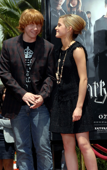Rupert Grint, Emma Watson At The Induction Ceremony For Harry Potter Foot-Print And Wand-Print Ceremony, Grauman'S Chinese Theatre, Los Angeles, Ca, July 09, 2007. Photo By Dee CerconeEverett Collection Celebrity - Item # VAREVC0709JLCDX019
