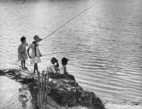 South: Black Children, 1940. /Nafrican American Girls, One Of Them Light-Skinned, Fishing In The Cane River At Melrose, Natchitoches Parish, Lousiana. Photograph By Marion Post Wolcott, June 1940. Poster Print by Granger Collection - Item # VARGRC013