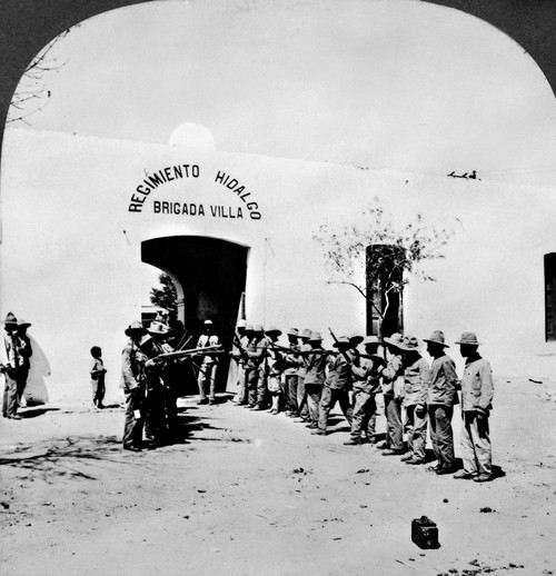 Mexican Revolution, 1914. /Narmed Revolutionary Troops Lined Up Outside The Entrance Of General Francisco 'Pancho' Villa'S Headquarters In Ciudad Juarez, Mexico, During The Mexican Revolution, 1914. Stereograph. Poster Print by Granger Collection - I