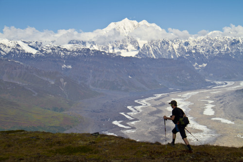 Silhouette Of A Man Hiking In The Tokosha Mountains Above The Tokositna Glacier With Mt. Hunter And The Alaska Range In The Background, Denali National Park & Preserve, Interior Alaska, Summer Poster Print by Joe Stock / Design Pics - Item # VARDPI20
