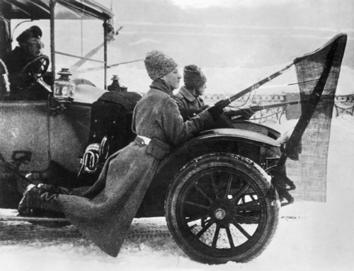 Russian Revolution, 1917./Npro-Bolshevik Soldiers With Red Flags Fixed To Their Bayonets Patrolling The Streets Of Petrograd In A Car Commandeered From The Provisional Government. Photograph, March 1917. Poster Print by Granger Collection - Item # VA