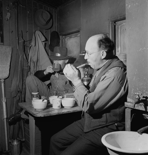 Railroad Workers, 1943. /Nconductor James M. Johnson And Brakeman Jack Torbet Of Waynoka, Oklahoma Having Lunch In The Caboose On The Atchison, Topeka And Santa Fe Railroad Line. Photograph By Jack Delano, March 1943. Poster Print by Granger Collecti Railroad Workers, 1943. /Nconductor James M. Johnson And Brakeman Jack Torbet Of Waynoka, Oklahoma Having Lunch In The Caboose On The Atchison, Topeka And Santa Fe Railroad Line. Photograph By Jack Delano, March 1943. Poster Print by Granger Collecti