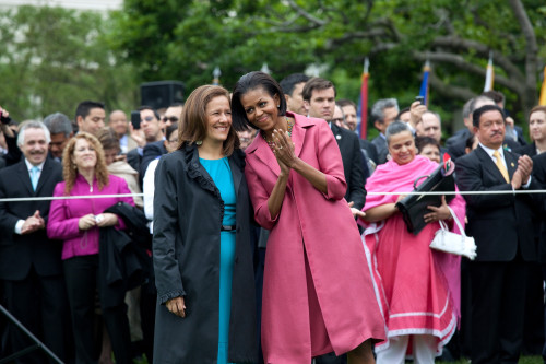 Michelle Obama And Mrs. Margarita Zavala Watch The State Arrival Ceremony On The South Lawn Of The White House. Michelle Wears A Carmine Viscose Jersey Dress With A Silk Nylon Coat From Calvin Klein'S Pre-Spring 2009 Collection. - Item # VAREVCHISL02