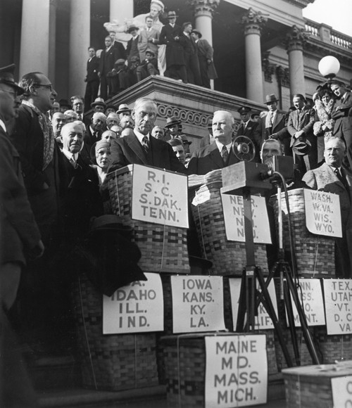 Smoot-Hawley Tariff Act. /Nsenator Reed Smoot, Left, And Representative Willis C. Hawley On The Steps Of The Capitol With Baskets Of Petitions For Reductions In Their Proposed Tariff Bill, 7 December 1929. Poster Print by Granger Collection - Item #