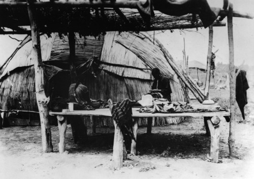 Sauk And Fox Women, C1890. /Nsauk And Fox Native American Women In Tama, Iowa, Doing Domestic Chores On A Work Platform In An Open-Sided Shelter, Next To A Wigwam Covered With Bulrushes. Photographed C1890. Poster Print by Granger Collection - Item #