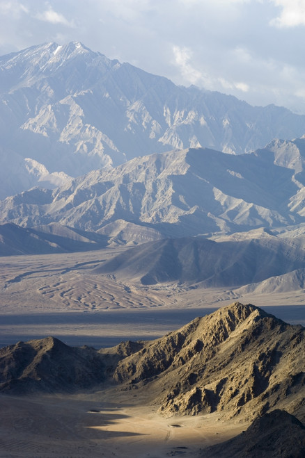 View across the Indus Valley from the Shanti (Peace) Stupa. Leh was the capital of the Himalayan kingdom of Ladakh, now the Leh District in the state of Jammu and Kashmir, India. Leh is at an altitude of 3,500 meters (11,483 ft). PosterPrint - Item #