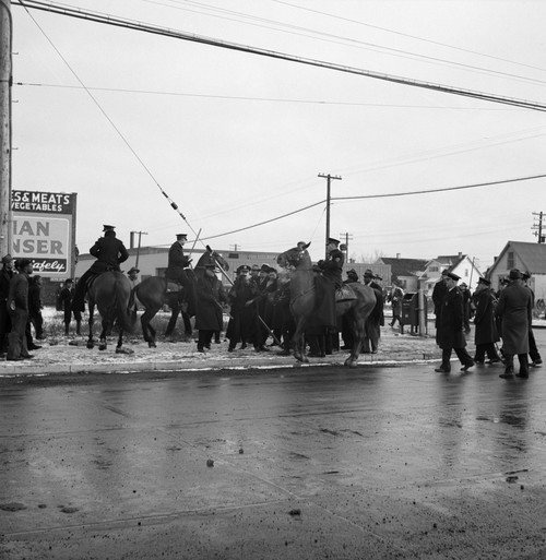 Detroit, 1942. /Nmounted Police Surrounding A Group Of Black Men During A Riot Caused By White Residents Attempting To Keep Black Families From Moving Into The Sojourner Truth Homes In Detroit, Michigan. Photograph By Arthur Siegel, February 1942. Po