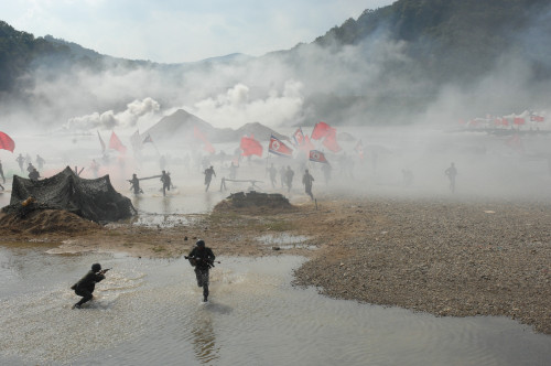 South Korean Soldiers Dressed As North Korean Infantry Charge South Korean Defenses At The Re-Enactment Of The Nakdong River Battle During The 60Th Anniversary Commemoration Of The Korean War In Waegwan South Korea. Sept. 3 2010. - Item # VAREVCHISL0 South Korean Soldiers Dressed As North Korean Infantry Charge South Korean Defenses At The Re-Enactment Of The Nakdong River Battle During The 60Th Anniversary Commemoration Of The Korean War In Waegwan South Korea. Sept. 3 2010. - Item # VAREVCHISL0
