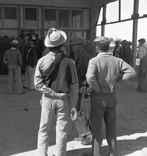 Farm Relief, 1939. /Nmigrant Farmers Standing Outside The Farm Security Administration Grant Office During The Pea Harvest In Calipatria, California. Photograph By Dorothea Lange, February 1939. Poster Print by Granger Collection - Item # VARGRC01241