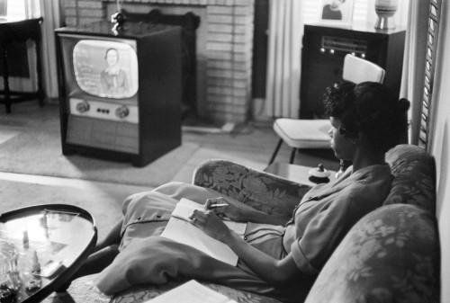 Anti-Integration, 1958. /Nan African American High School Girl In Little Rock, Arkansas, Learning A Lesson From The Television At Home When The Little Rock Schools Were Closed To Avoid Integration, September 1958. Photographed By Thomas O'Halloran. P