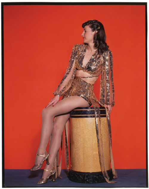 Barbara Stanwyck - Red Background Photo Print (8 x 10) - Item # DAP12547