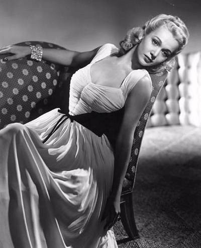 Carole Landis - reclining on couch Photo Print (8 x 10) - Item # DAP14465
