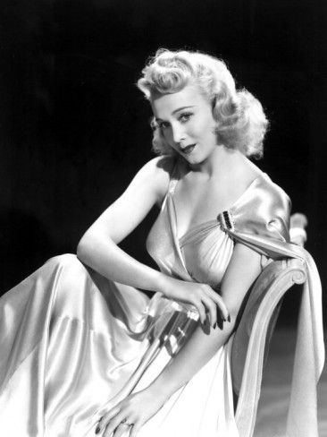 Carole Landis - sitting in silk dress Photo Print (8 x 10) - Item # DAP14401