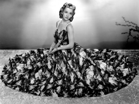 Carole Landis - sitting with dress spread out Photo Print (10 x 8) - Item # DAP14403