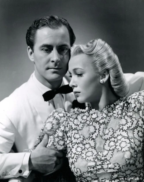 Carole Landis - with man holding arm Photo Print (8 x 10) - Item # DAP14494