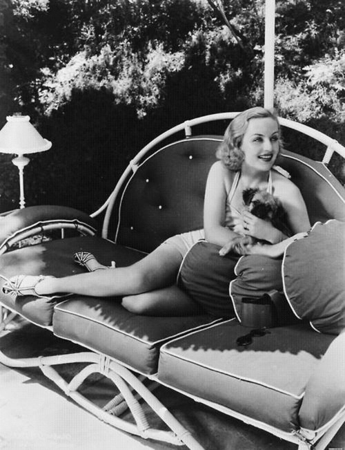 Carole Lombard - Sitting on couch with dog Photo Print (8 x 10) - Item # DAP14615