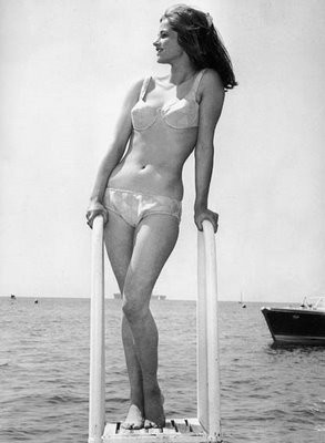 Charlotte Rampling - Holding on Ladder Photo Print (8 x 10) - Item # DAP14932