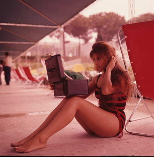 Claudia Cardinale - Checking Hair Photo Print (8 x 10) - Item # DAP15360