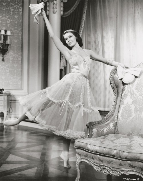 Cyd Charisse - dancing next to chair Photo Print (8 x 10) - Item # DAP15688