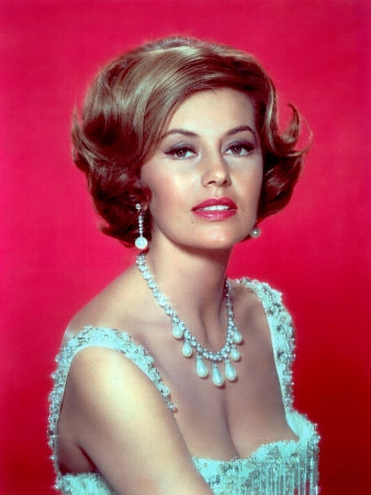 Cyd Charisse - headshot red background Photo Print (8 x 10) - Item # DAP15812